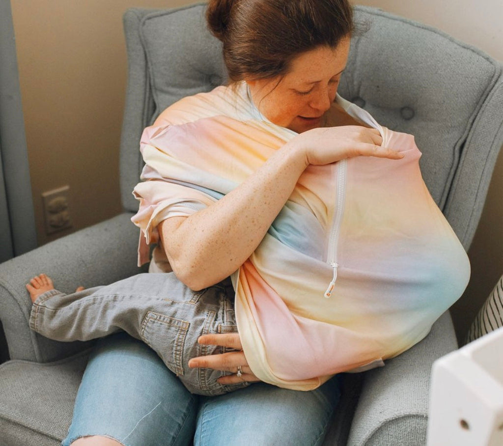 parent nursing her baby 